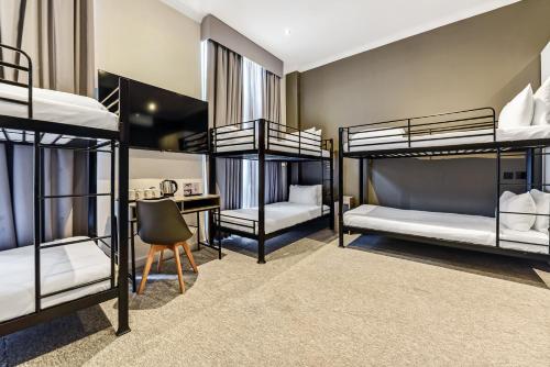 Habitación Cuádruple Superior del hotel Heeton Concept Kensington. Foto 4