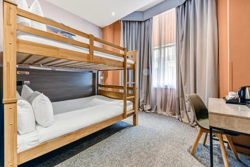 Habitación Cuádruple del hotel Heeton Concept Kensington. Foto 8