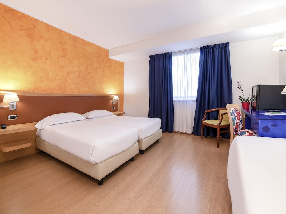 Habitación Gemela Estándar del hotel Ibis Styles Roma Vintage. Foto 6