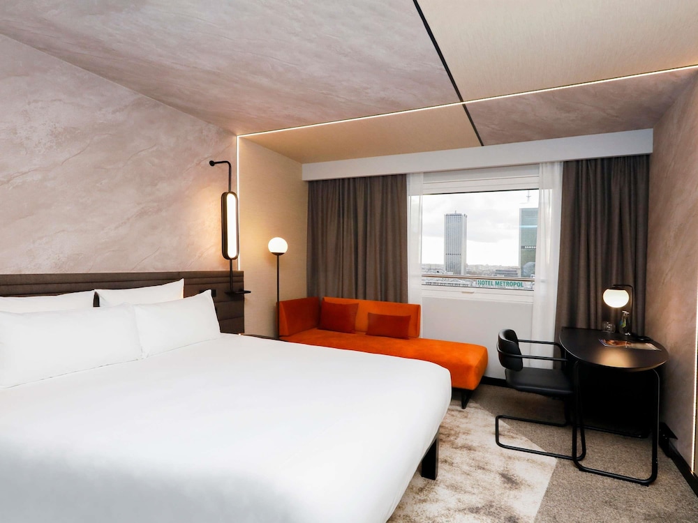 Habitación superior, varias camas del hotel Novotel Warszawa Centrum