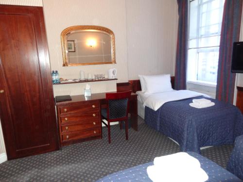 Habitación Familiar (5 personas) del hotel Regency House. Foto 2