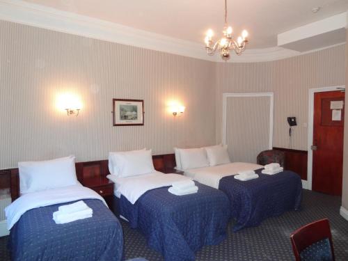 Habitación Familiar (5 personas) del hotel Regency House. Foto 3