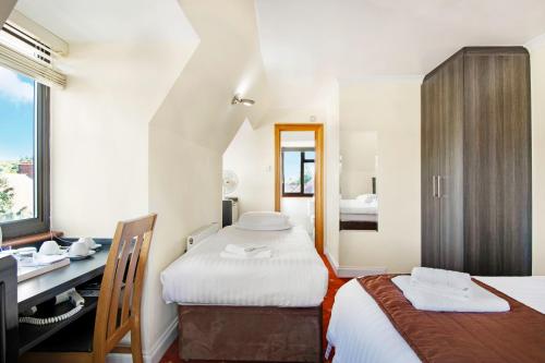 Habitación Doble Económica - 2 camas del hotel The Brent. Foto 1