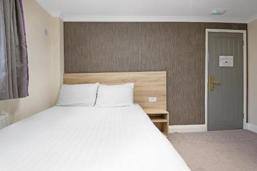 Habitación Doble Estándar del hotel OYO London 24 Sussex. Foto 1