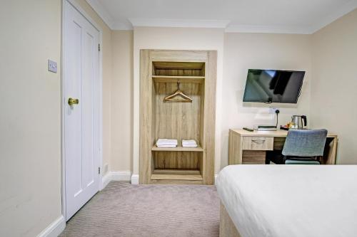 Habitación Doble Estándar del hotel OYO London 24 Sussex. Foto 2