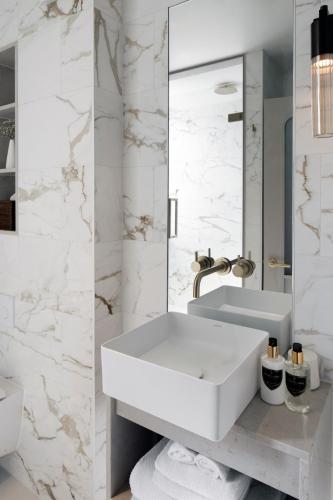 Salón del hotel The Marble Arch Suites. Foto 2