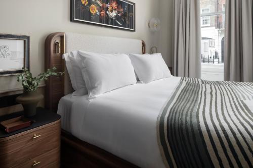 Family Salon del hotel The Marble Arch Suites. Foto 2