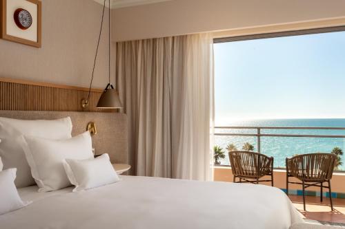 Habitación Doble con vistas al mar - 1 o 2 camas del hotel Grande Real Santa Eulalia Resort. Foto 9