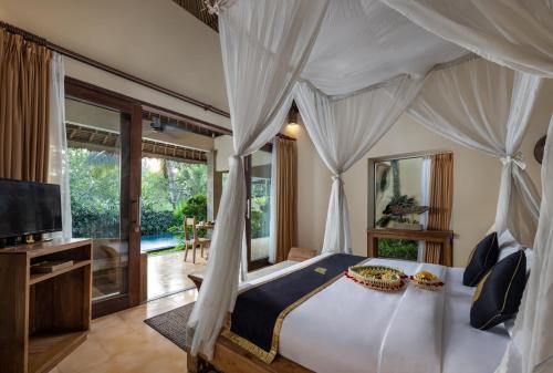 Villa con 1 dormitorio y piscina privada del hotel The Sankara Resort By Pramana. Foto 1