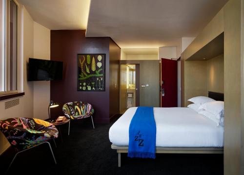 Habitación Deluxe con cama grande del hotel Marrable's. Foto 2