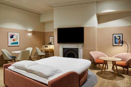 Estudio de planta abierta de 1 dormitorio del hotel Suffolk Lane by Blueprint Living. Foto 7