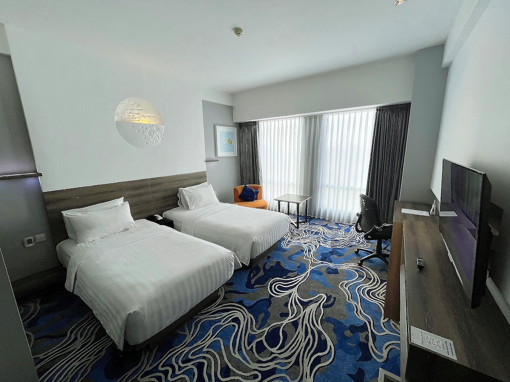 Habitación superior con 2 camas individuales, 2 camas individuales del hotel Novotel Bandung
