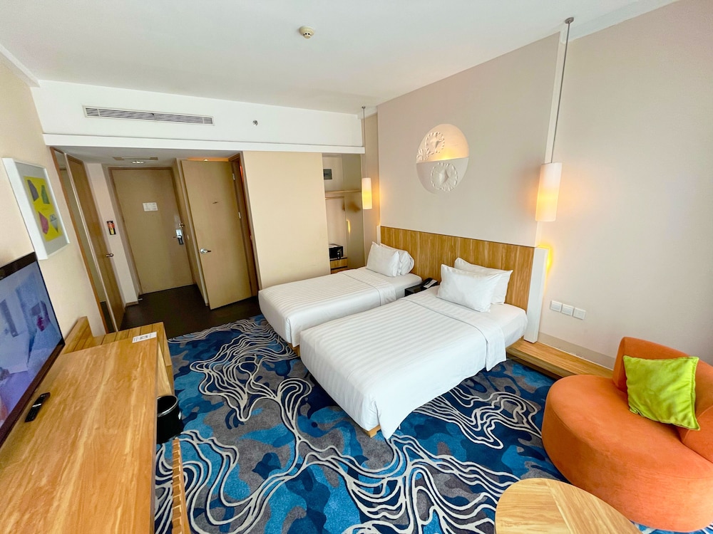 Habitación superior con 2 camas individuales, 2 camas individuales del hotel Novotel Bandung. Foto 1