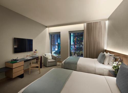 Alojamiento Premier con 2 camas grandes y vistas a la ciudad del hotel The Knickerbocker. Foto 2