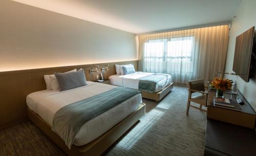 Habitación Deluxe - 2 camas grandes del hotel The Knickerbocker. Foto 2