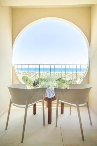 Habitación Doble Premium con vistas al mar del hotel Ozadi Altura Beach Resort. Foto 9