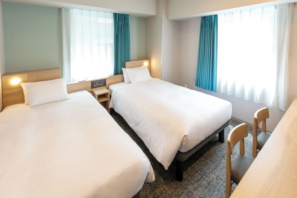 Habitación con 2 camas individuales, no fumadores (Renovated) del hotel Sotetsu Fresa Inn Nihombashi Ningyocho. Foto 7