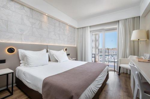 Habitación Doble con vistas al puerto deportivo - 1 o 2 camas del hotel Ap Eva Senses. Foto 1