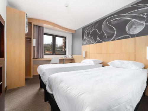 Habitación Doble Estándar con vistas al puerto - 2 camas del hotel Ibis Southampton Centre. Foto 1