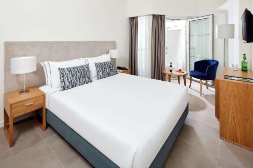 Habitación Doble Estándar - 1 o 2 camas del hotel NH Lagos Algarve Resort. Foto 7