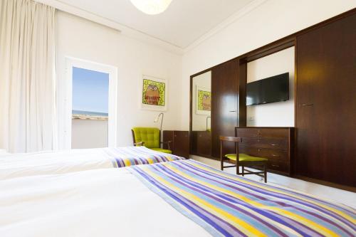 Habitación Doble con vistas al mar y balcón del hotel Vasco Da Gama. Foto 1