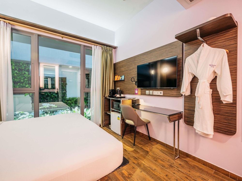 Habitación Privilege con vistas al jardín - 1 cama doble del hotel Mercure Singapore Tyrwhitt. Foto 10