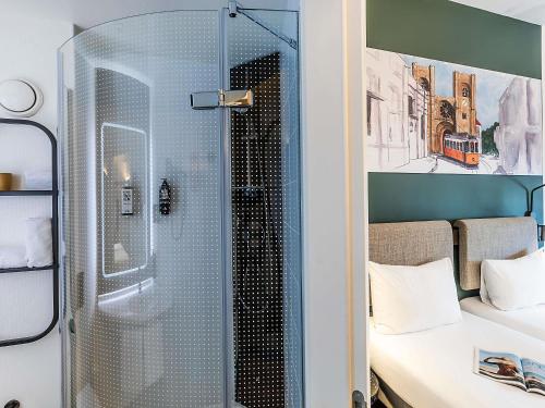 Habitación Doble Estándar - 2 camas del hotel Ibis Lisboa Parque Das Naçoes. Foto 8