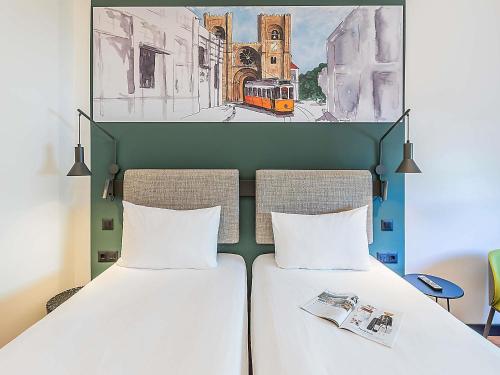 Habitación Doble Estándar - 2 camas del hotel Ibis Lisboa Parque Das Naçoes. Foto 9