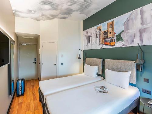 Habitación Doble Estándar - 2 camas del hotel Ibis Lisboa Parque Das Naçoes. Foto 3