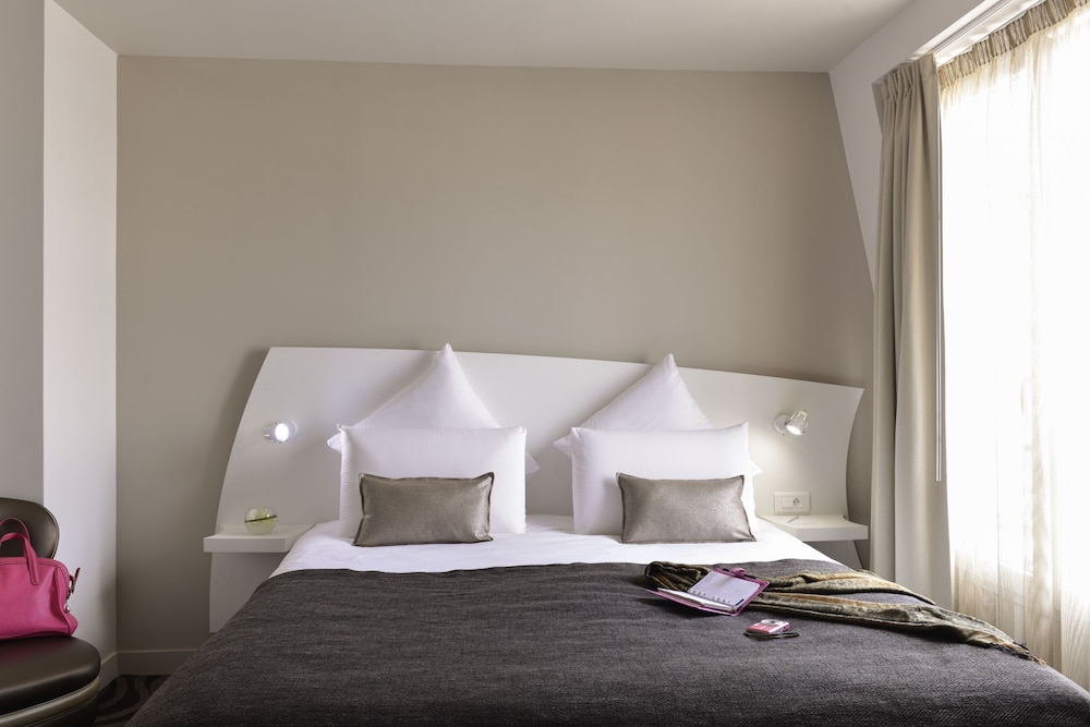 Habitación Classic - Dos camas individuales del hotel Mercure Paris Levallois Perret. Foto 1