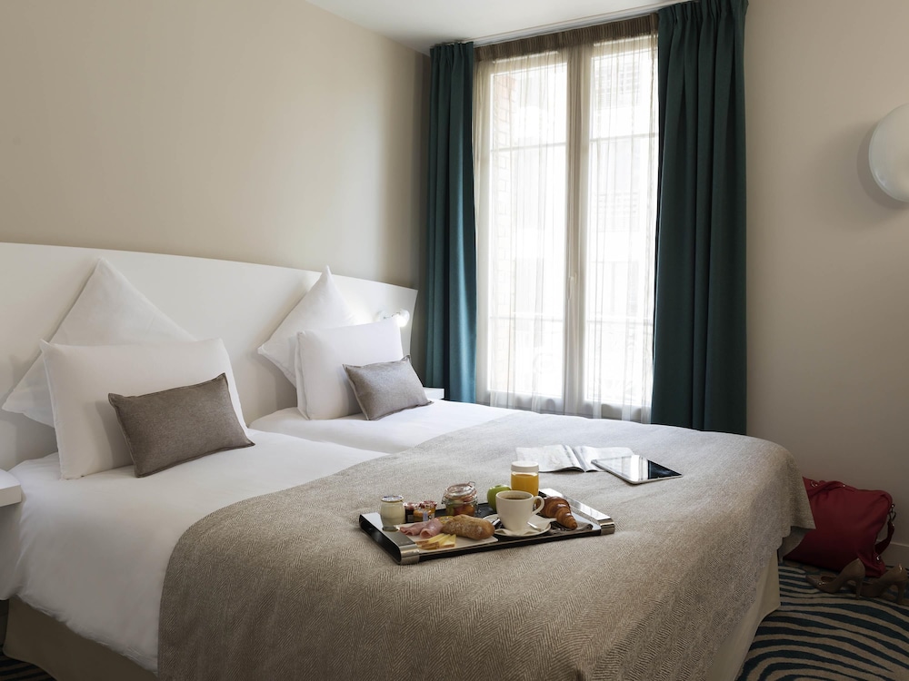 Habitación Privilege con 2 camas individuales del hotel Mercure Paris Levallois Perret. Foto 2