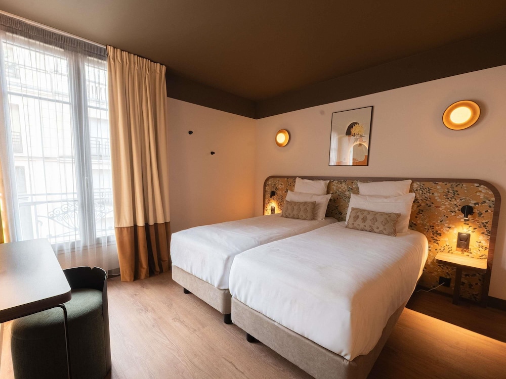 Habitación Classic - Dos camas individuales del hotel Mercure Paris Levallois Perret. Foto 3