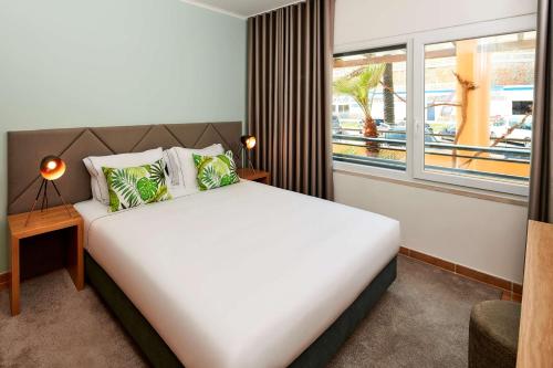 Apartamento Marina Beach de 1 dormitorio con cama supletoria del hotel NH Marina Portimao Resort. Foto 4