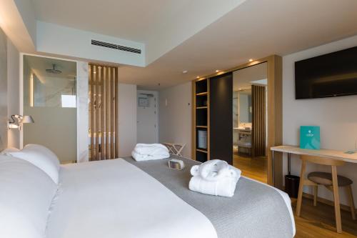 Habitación Doble con vistas frontales al mar del hotel Talayot - Adults Only. Foto 10
