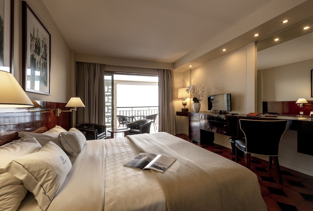 Habitación con 2 camas individuales, balcón, vistas al mar del hotel Algarve Casino