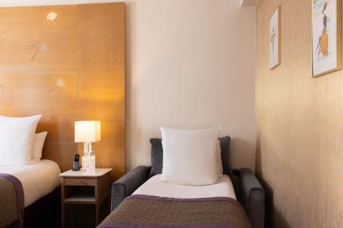 Habitación Triple del hotel Du Muguet. Foto 2