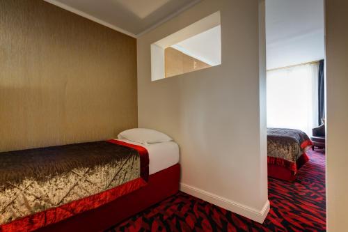 Habitación Triple del hotel Du Muguet. Foto 4