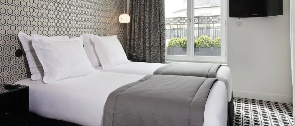 Habitación clásica con 2 camas individuales del hotel Emile
