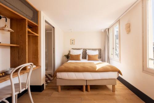 Habitación Doble Deluxe del hotel de la Gaîté. Foto 6