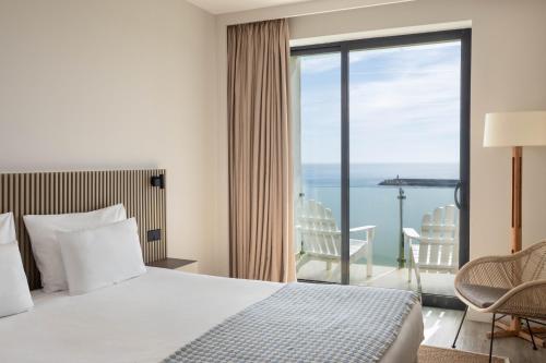 Suite con vistas frontales al mar del hotel Memmo Baleeira