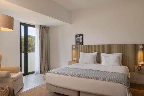 Habitación Doble con vistas a la calle del hotel Memmo Baleeira. Foto 1