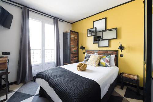 Habitación Clásica del hotel Madrigal. Foto 1