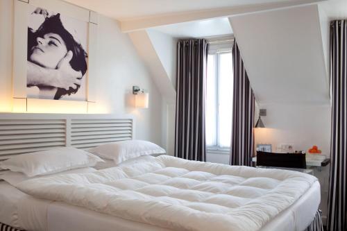 Habitación Doble Clásica del hotel Le Petit Madeleine Hotel. Foto 6