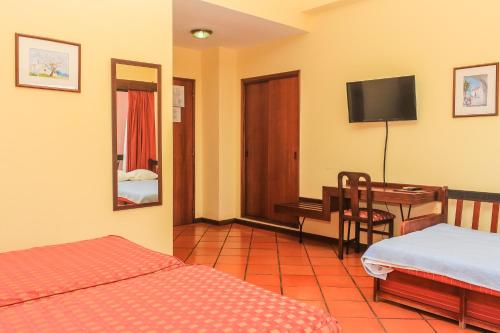 Habitación Triple del hotel Colina Dos Mouros. Foto 1