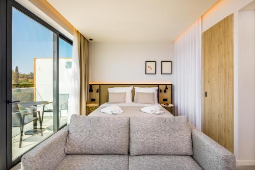 Habitación Doble Premium con vistas parciales al mar del hotel AP Cabanas Beach and Nature. Foto 5