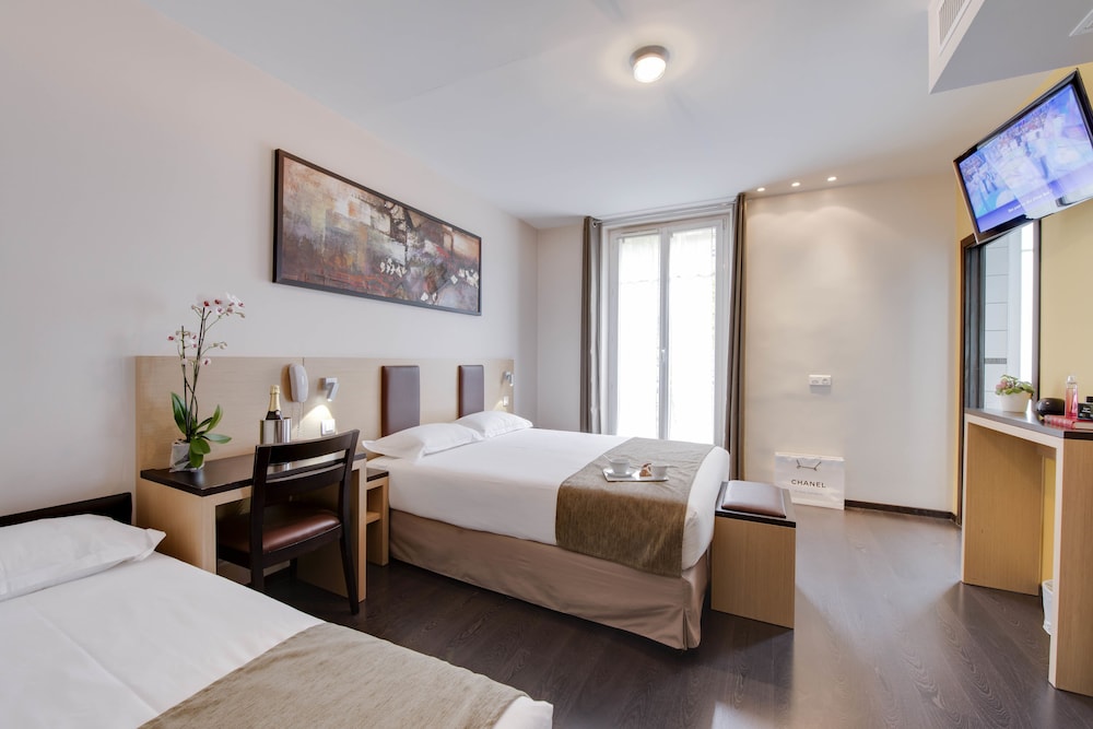 Habitación triple del hotel Source Hotel