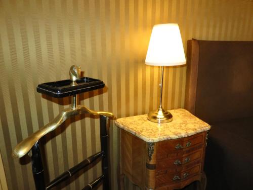 Habitación Triple Deluxe del hotel Windsor Home. Foto 10