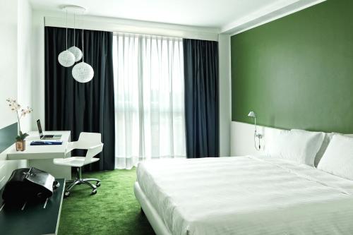 Habitación Doble del hotel IDEA HOTEL MILANO MALPENSA AIRPORT. Foto 1