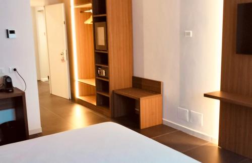 Habitación Deluxe con cama extragrande del hotel IDEA HOTEL MILANO MALPENSA AIRPORT