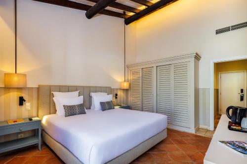 Habitación Familiar con vistas al jardín del hotel Pestana Vila Sol - Vilamoura Premium Golf Resort. Foto 5